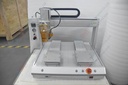 Double header glue dispensing machine